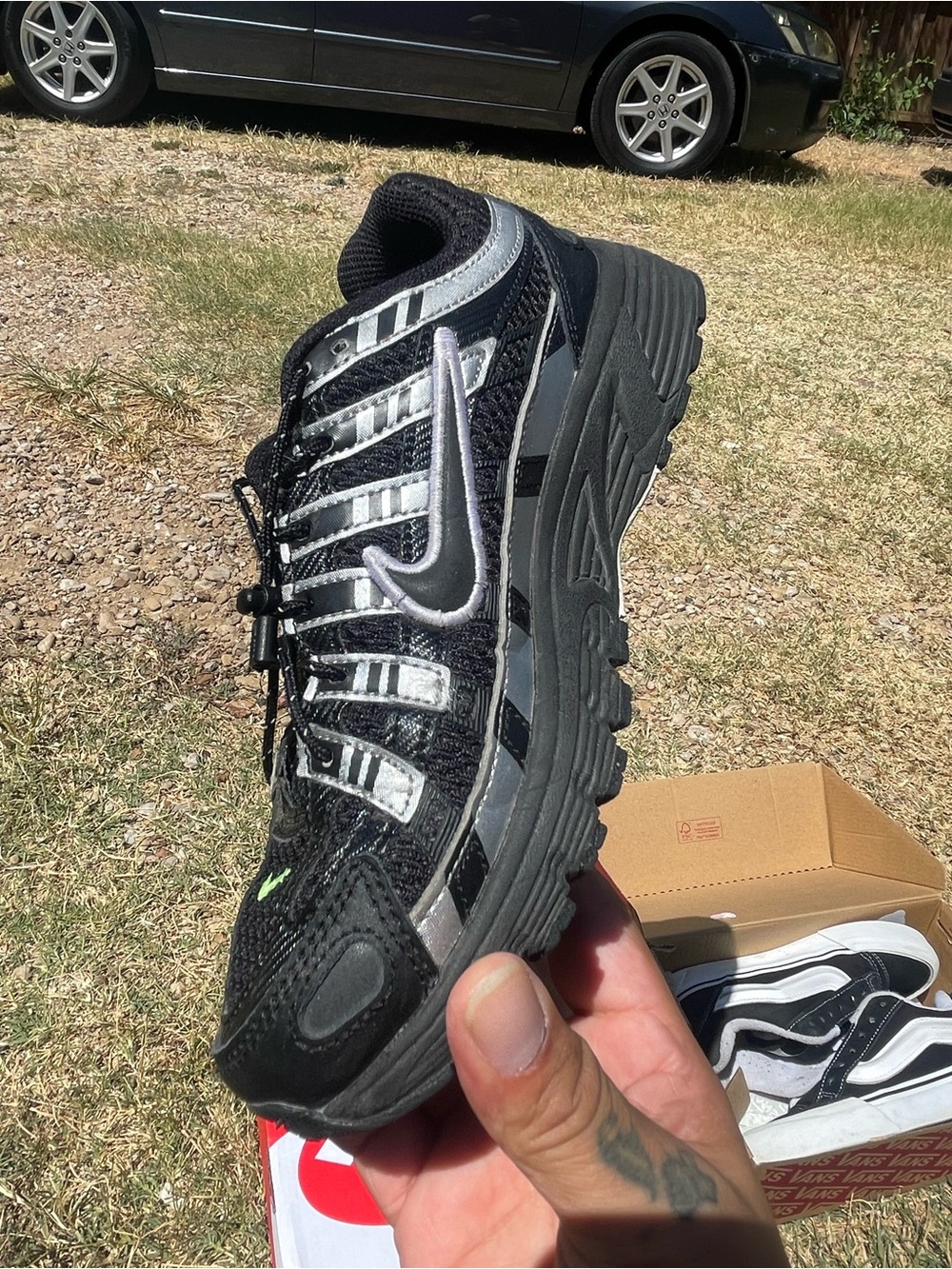 Nike Men's Black and Silver Athletic Trainer